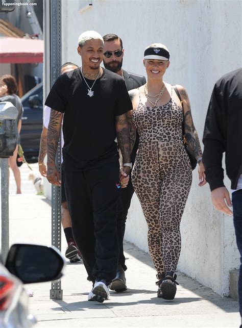 Amber Rose See Through Top. Her real name is Amber Levonchuck. She was born on October 21, 1983 in Philly. She was married to Wiz Khalifa from 2013-2014 and they have on child together. She is famous for starting the SlutWalk that is held in Los Angeles to honor all women who have been judged by their looks.